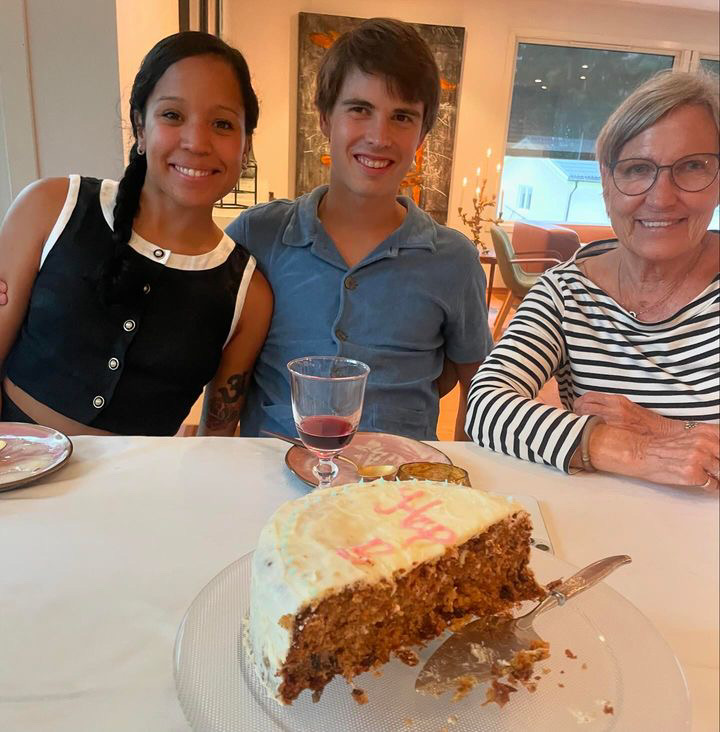 Oscar and Amber sharing a meal with family