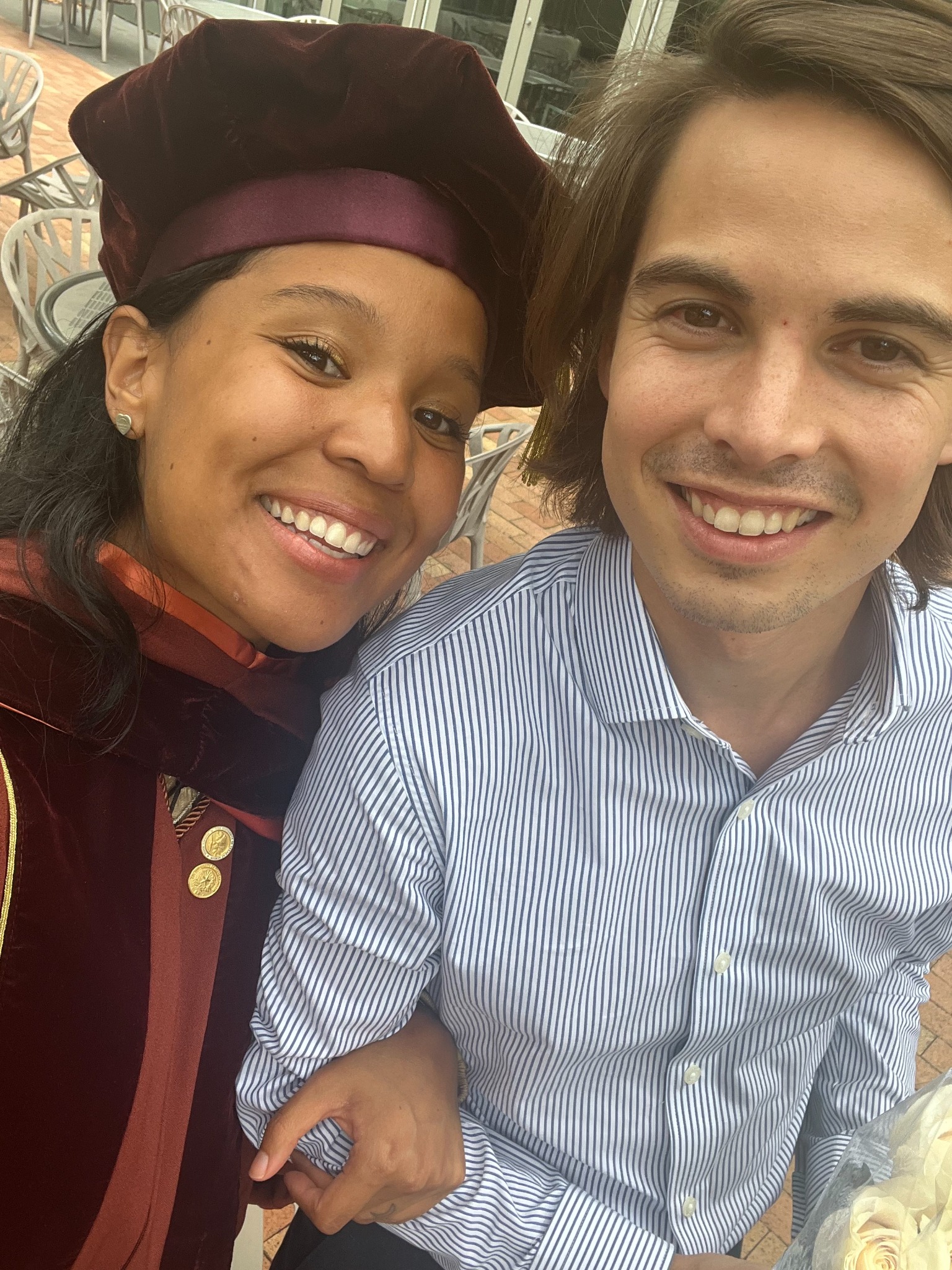 Oscar and Amber celebrating graduation