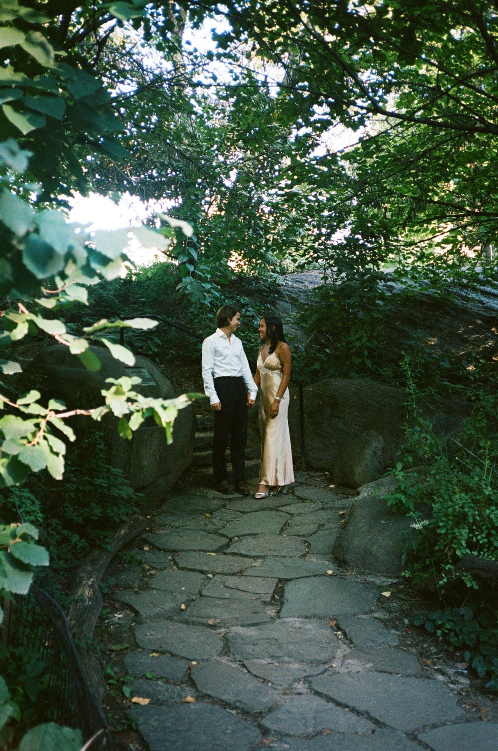 Oscar and Amber on a leafy garden path